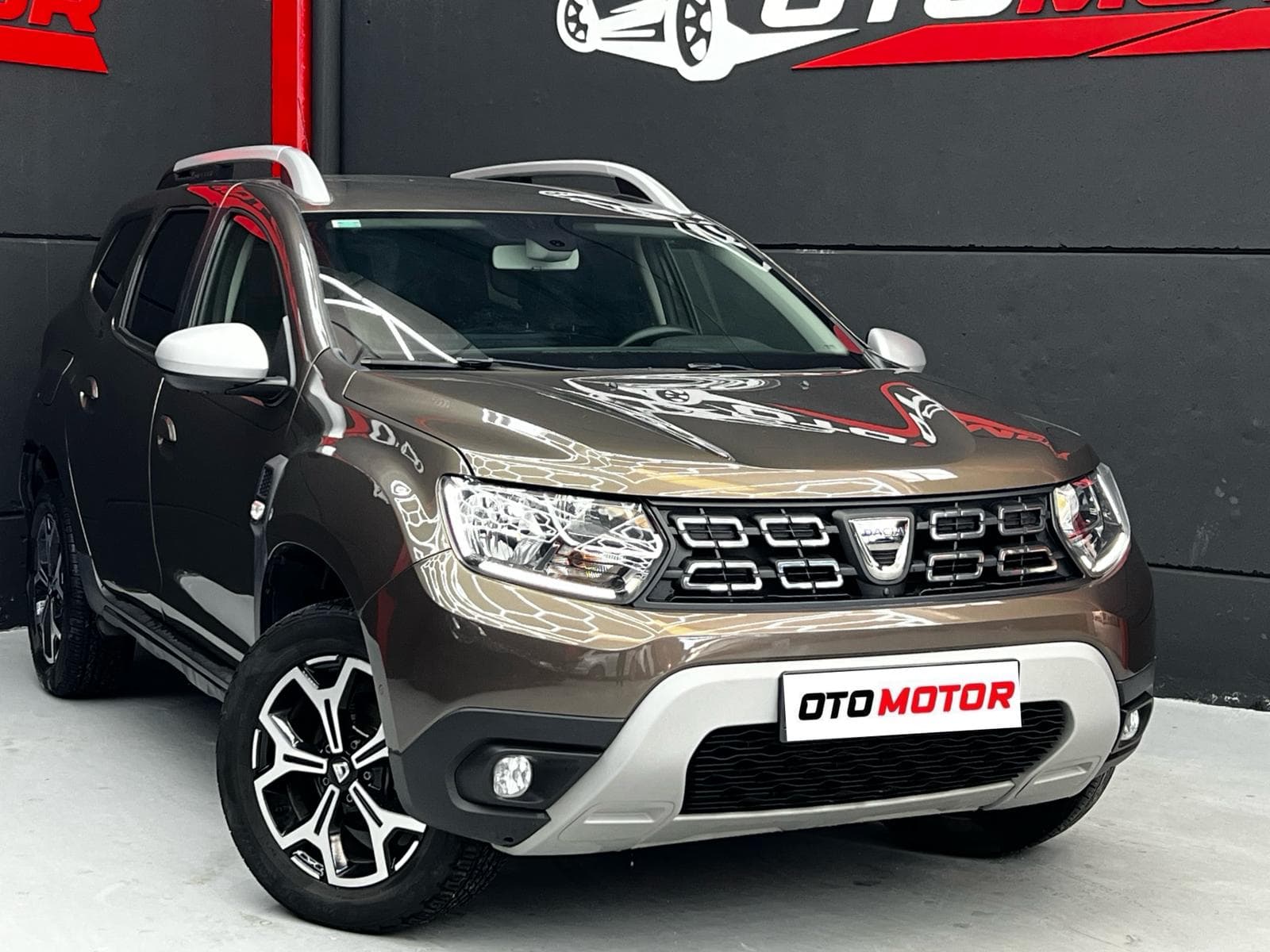 Dacia Duster Prestige — vista frontal izquierda (1/17)